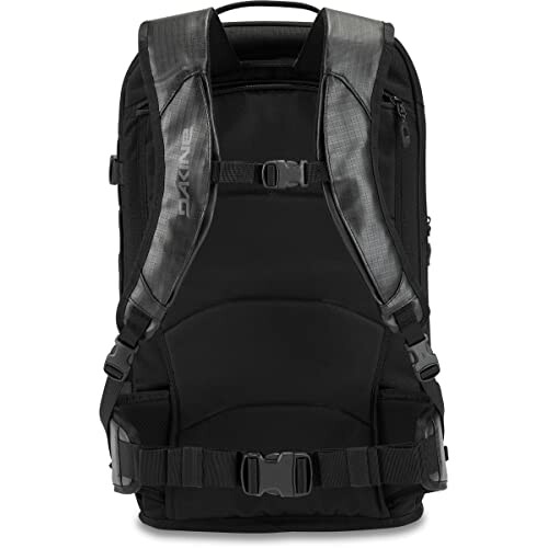 Black Dakine backpack with padded straps and multiple buckles.